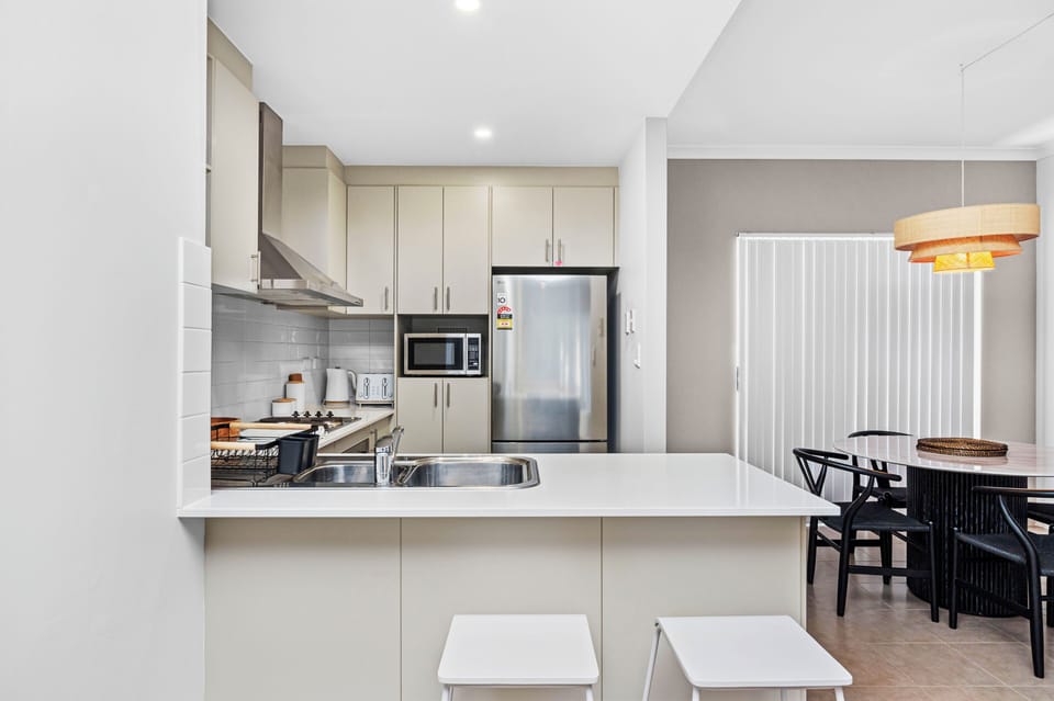 Full kitchen, large fridge, everything you'll need for your stay with thoughtful extras
