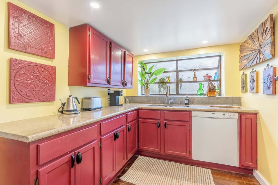 The fully equipped kitchen has everything needed for preparing meals.