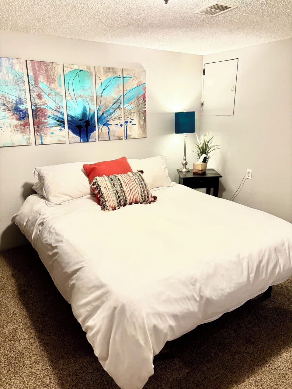 Private bedroom with queen bed and luxury linens