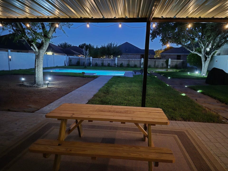 In the evening enjoy the ambience of the pool and patio. 