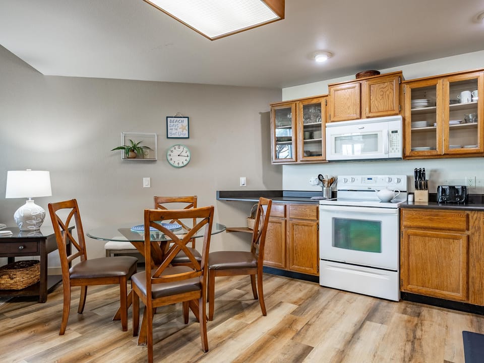 Cozy kitchen and dining area with warm wood accents