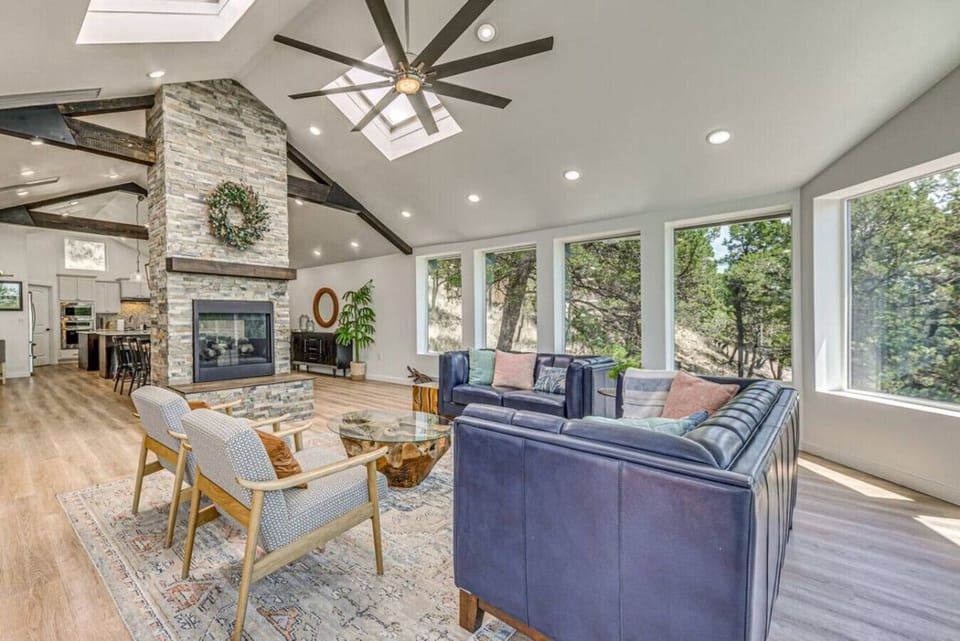 Bright & Airy Living Room | Panoramic Windows, Cozy Fireplace & Modern Comfort