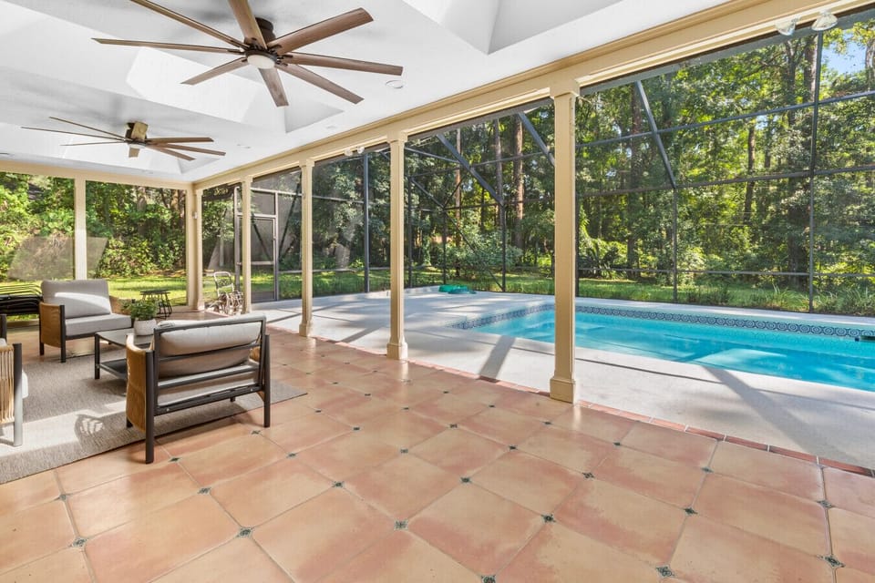 Beautiful screened outdoor living area with pool (screen = no bugs!)