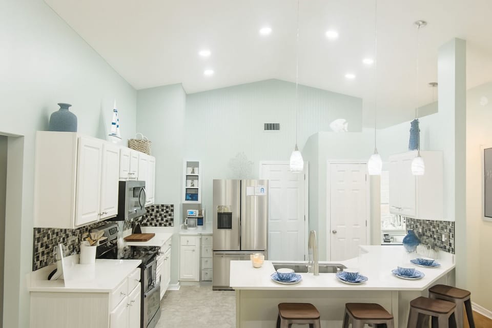 Freshly painted kitchen w/oversized fridge!