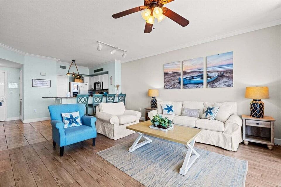 Open concept living area with stylish furnishings