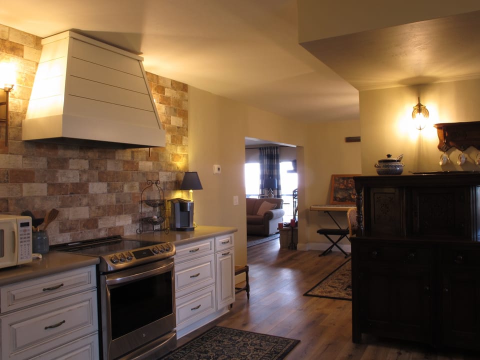 Looking from kitchen to dining area and great room
