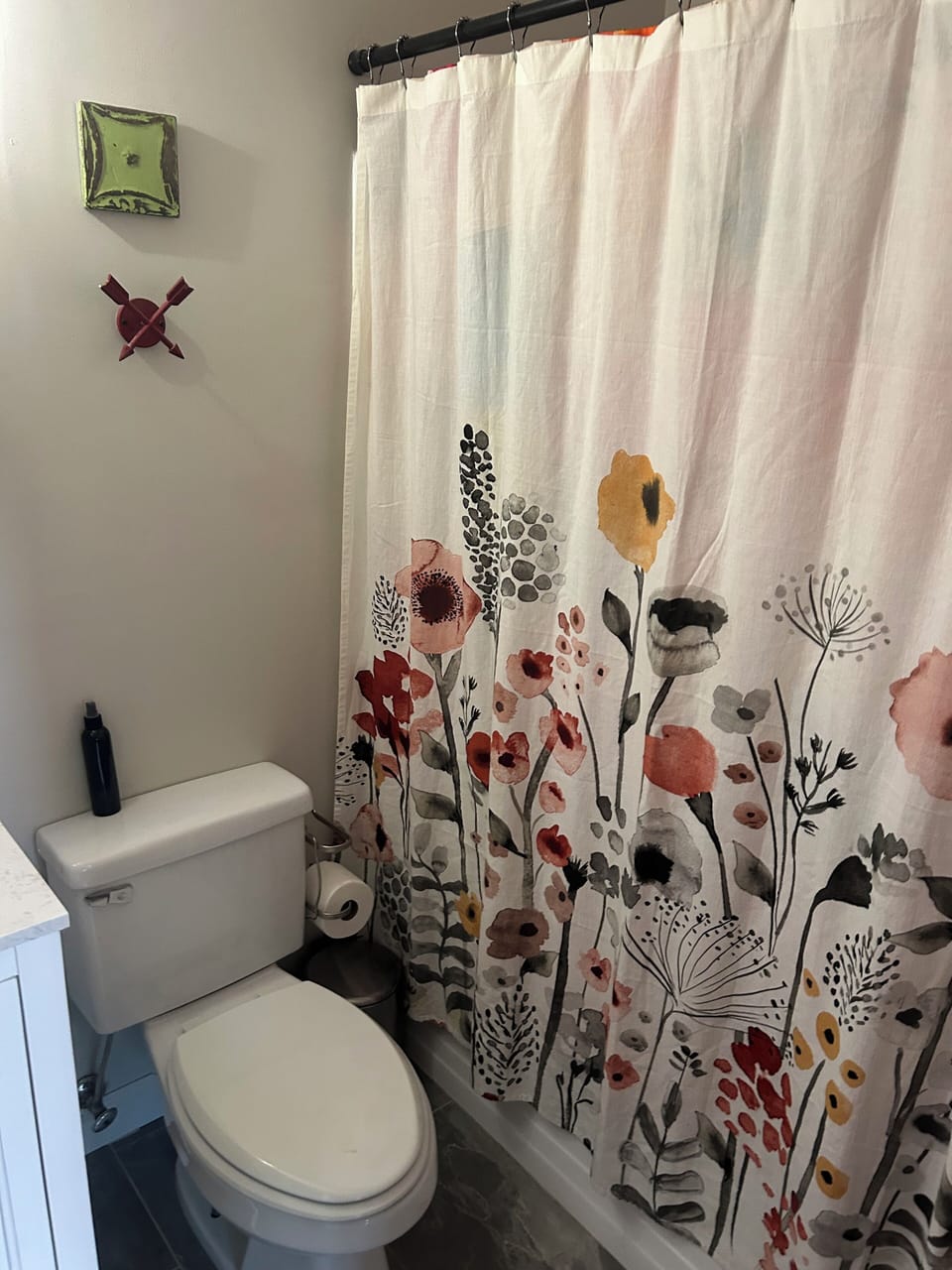 Towels for this bath are stored in the bedroom closet