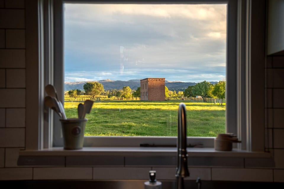 Enjoy sweeping views of Earnscleugh Castle and the surrounding countryside right from the kitchen window