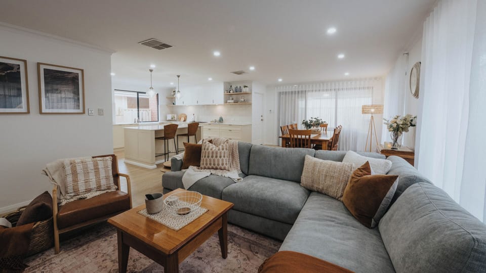 Sink into the couch under a throw rug to watch  your favourite Netflix, 55cm tv.
