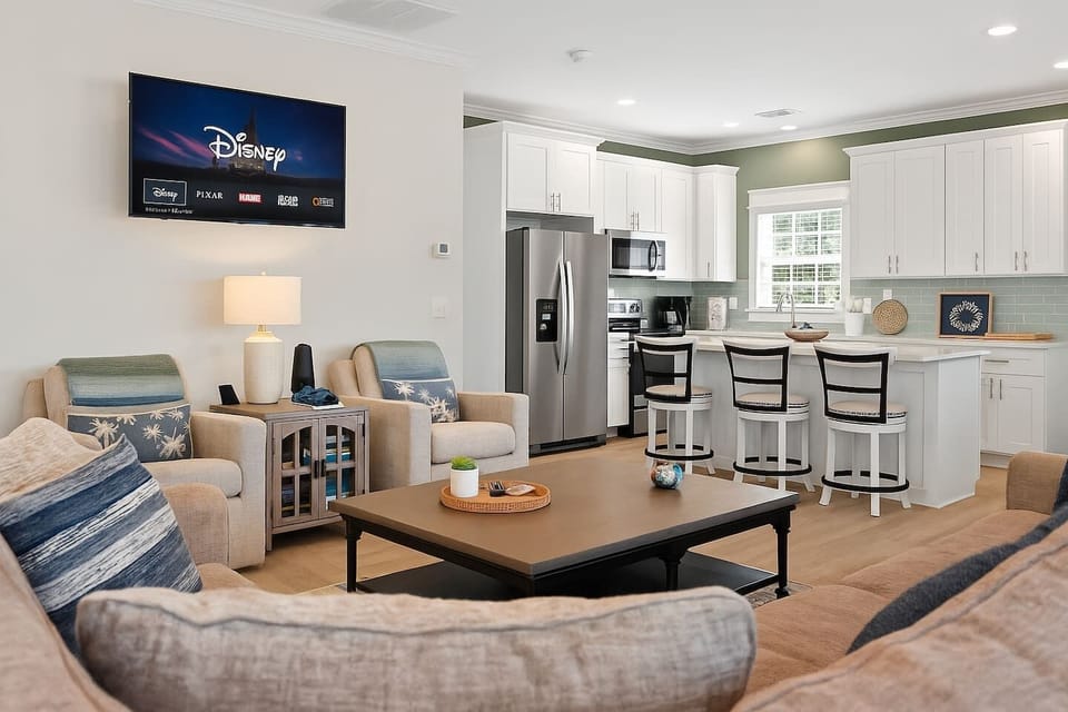 Relax together in this open-plan living space designed for families and friends.
