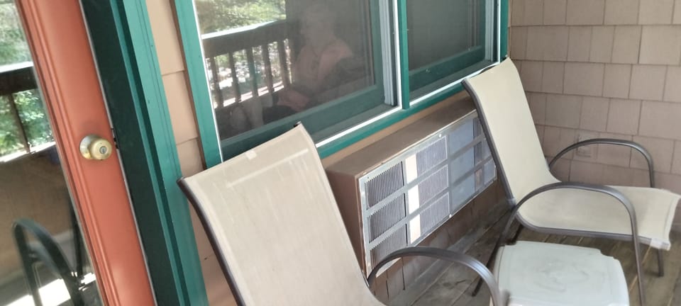 Covered porch with river view.