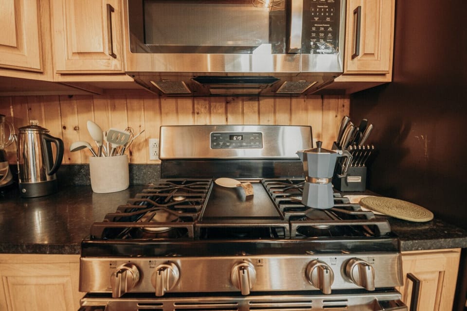 Cooking area with stainless appliances