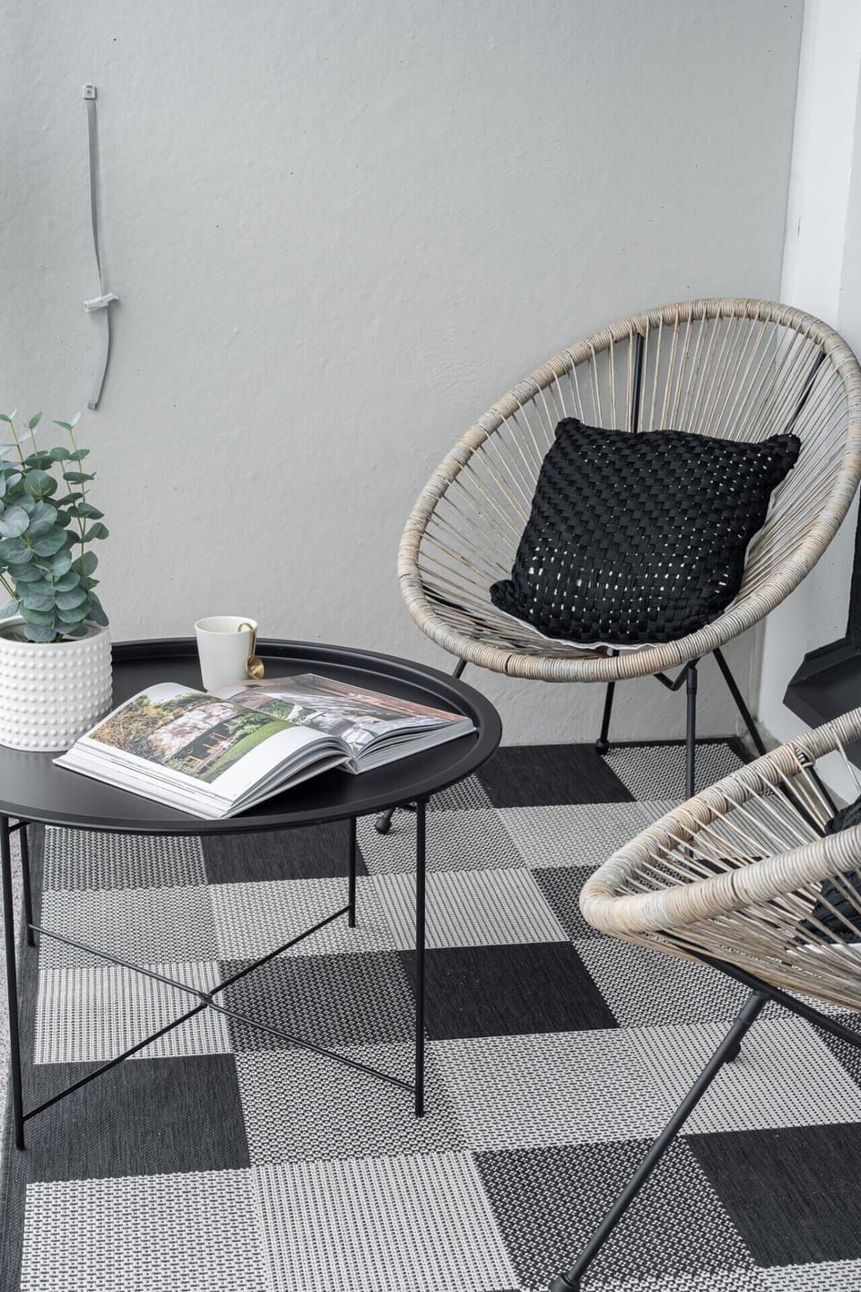 Sheltered balcony lounge—the perfect spot to unwind and take in the fresh city air.