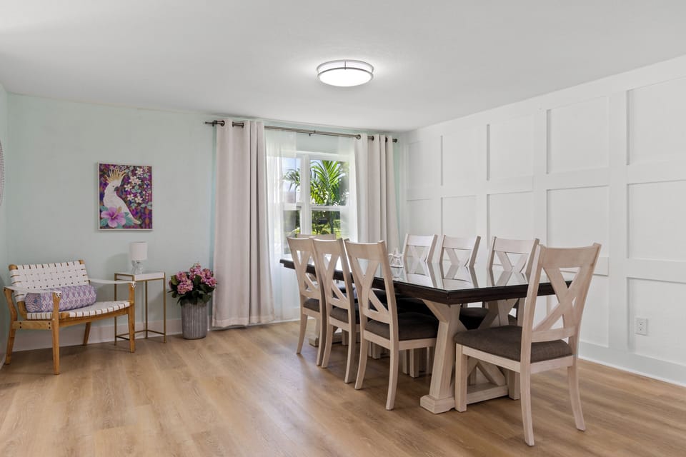 Plenty of seating for 8 & the accompanying kitchen island makes seating for 11.