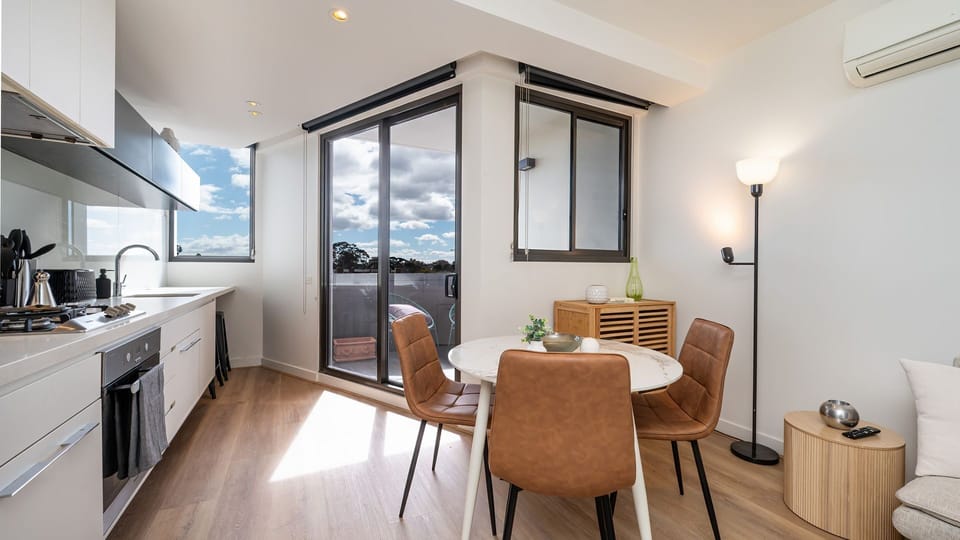 Large glass doors leading out to the balcony