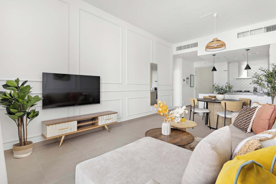 Light-filled living room overlooking the city