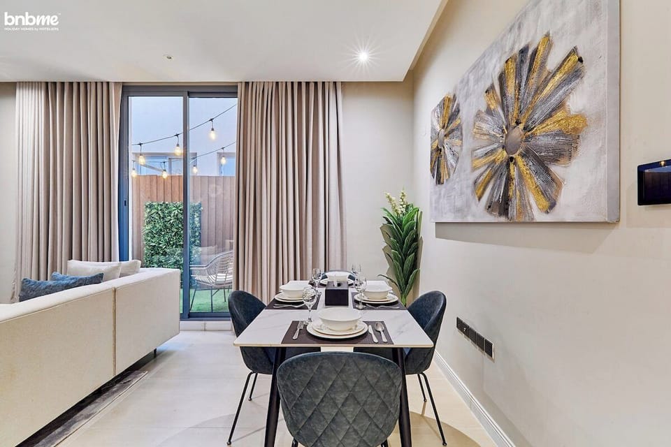 Dining Area: "Gather and dine in style in our elegantly appointed dining room, perfect for sharing meals and creating cherished memories with loved ones."