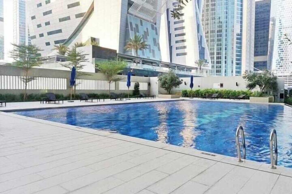 Public Pool: "Dive into relaxation at our inviting public pool, the perfect spot to cool off and soak up the sun."