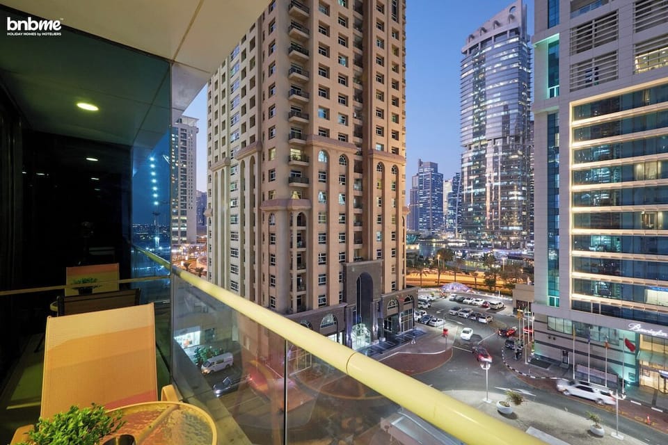 Enjoy panoramic city views from the spacious balcony, a great spot for unwinding at any time of the day.