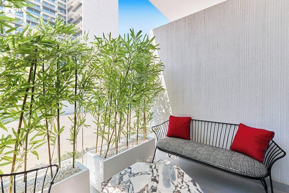 Step out onto your private balcony and unwind in a peaceful setting. Surrounded by lush greenery and stylish seating, this cosy spot is perfect for sipping your morning coffee or enjoying a quiet evening under the open sky.