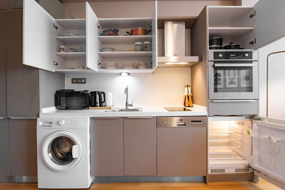 Open-plan layout connects kitchen and living space for a seamless, social experience.