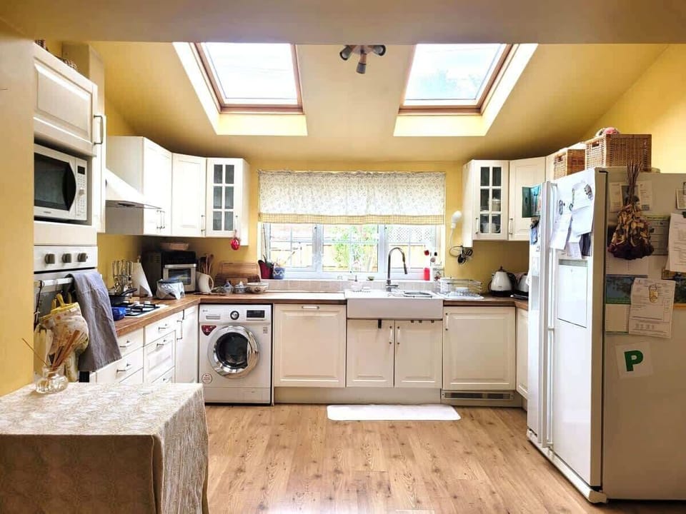 Kitchen - lots of light from the large sky lights