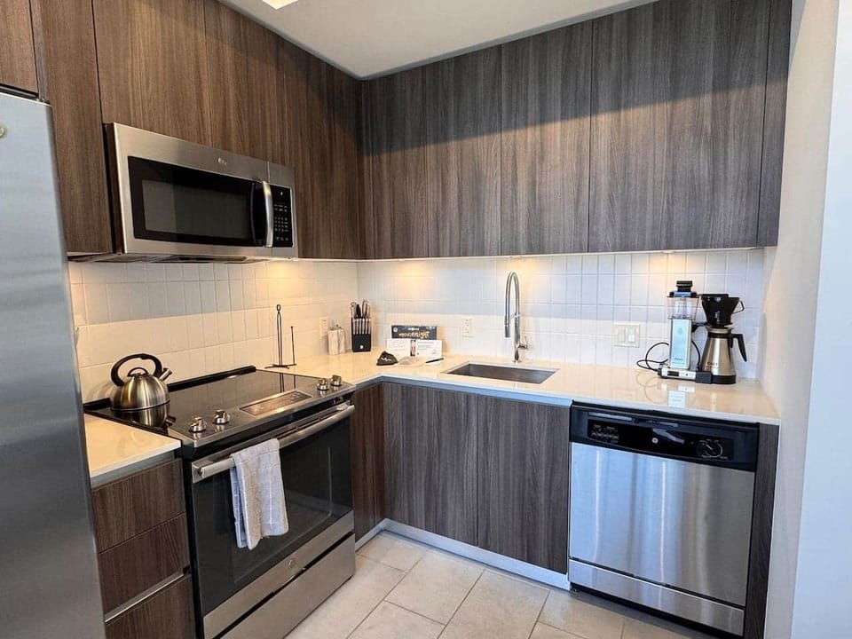 Stylish, modern, and upgraded with extras. Whole Foods and Trader Joe’s are both nearby (and deliver!) to keep your kitchen stocked.