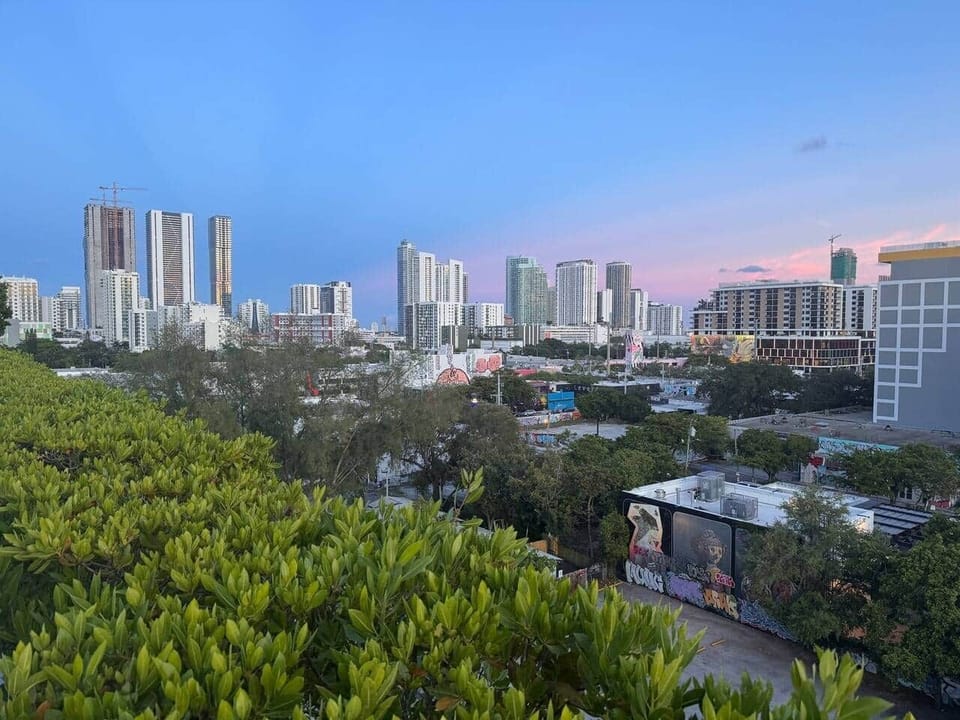 Penthouse loft with stunning views of Wynwood and the Edgewater skyline. Unlike many units that face inward, this top-floor home offers expansive city views and natural light—perfect for soaking in Miami’s vibrant energy.