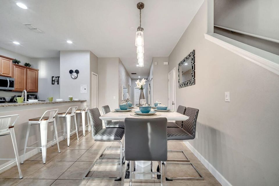 Spacious open-concept layout combining kitchen, dining, and living areas—perfect for family gatherings.