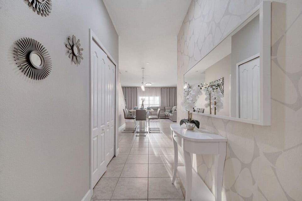Beautifully decorated corridor guiding you toward the heart of the home.