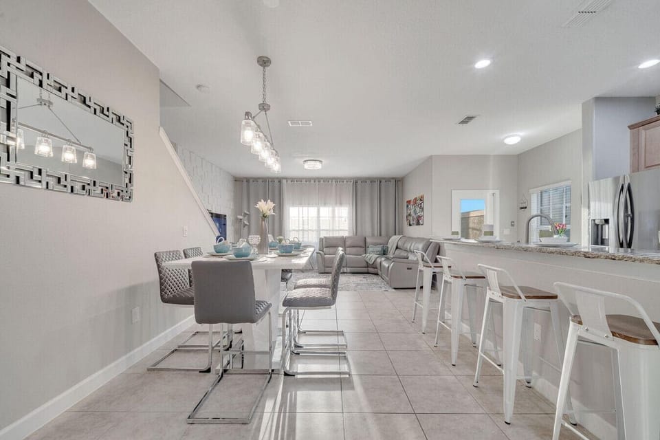 Spacious open-concept layout combining kitchen, dining, and living areas—perfect for family gatherings.
