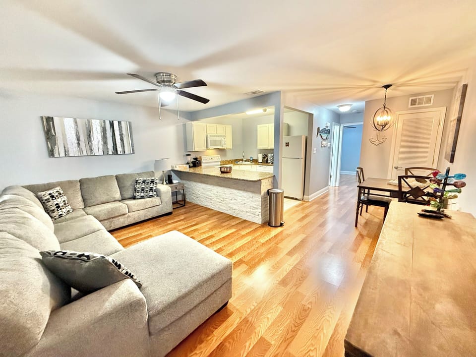 Living Room Looking Into Kitchen and Dining Area