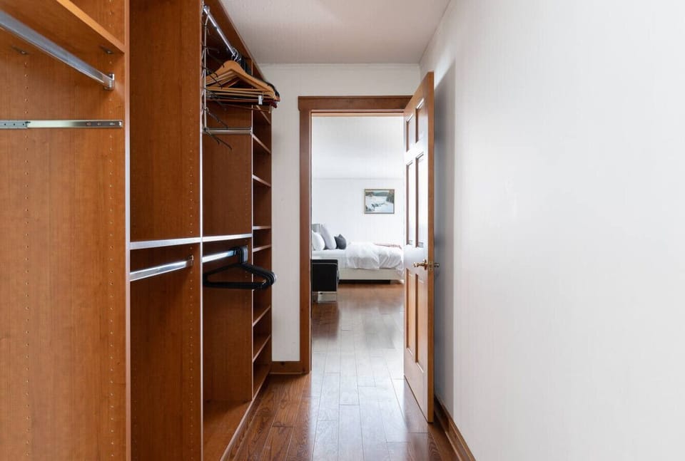 The spacious walk-in closet includes a safe for your valuables and plenty of room for all your clothing and gear.