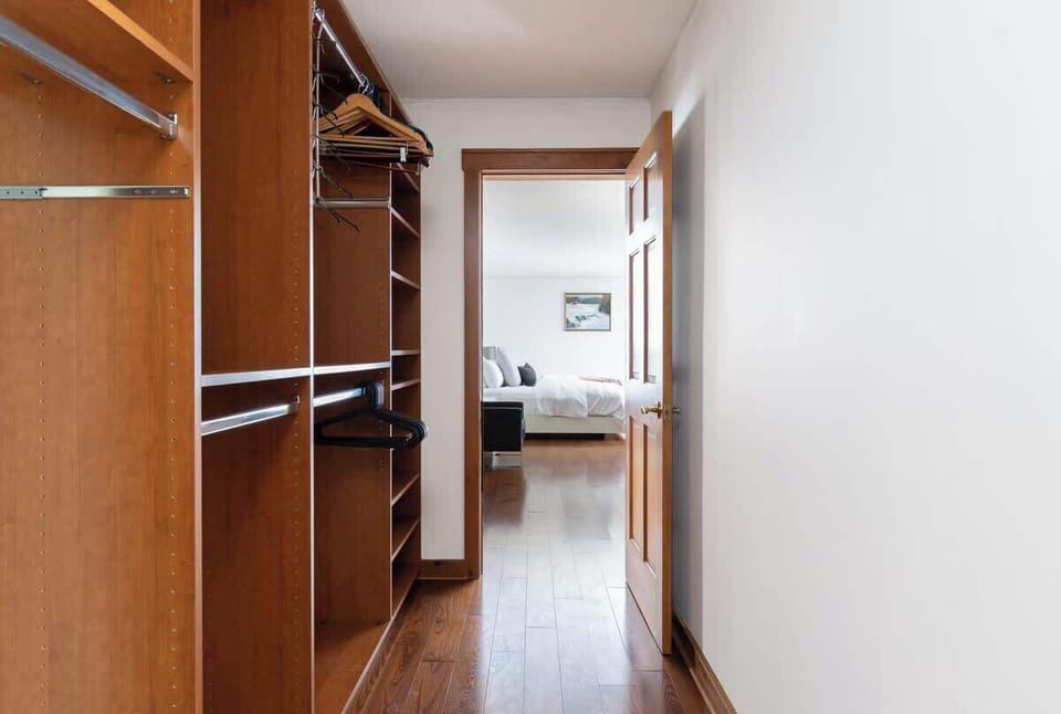 The spacious walk-in closet includes a safe for your valuables and plenty of room for all your clothing and gear.