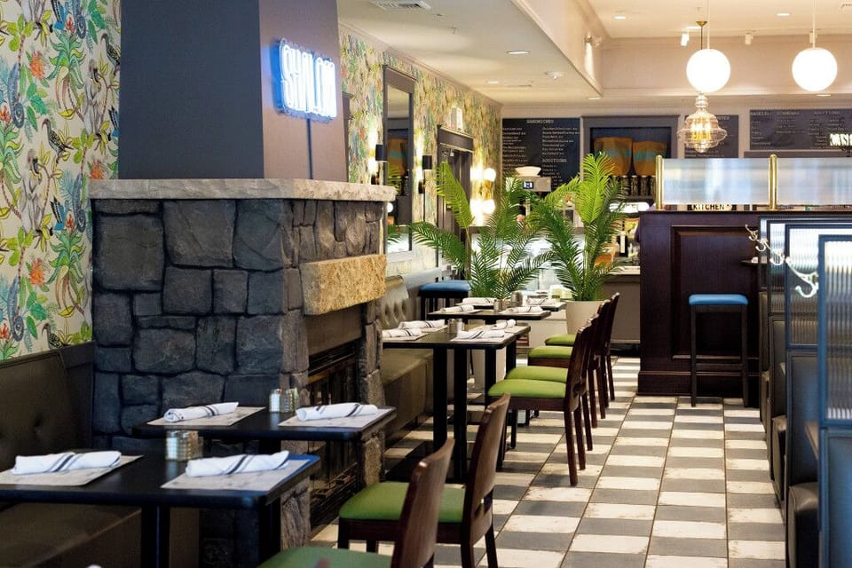 Gather by the cozy fireplace for an intimate, relaxed meal