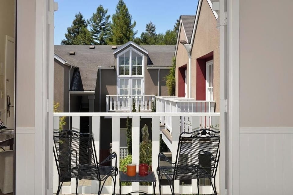 Sip morning coffee on your balcony overlooking the peaceful courtyard.