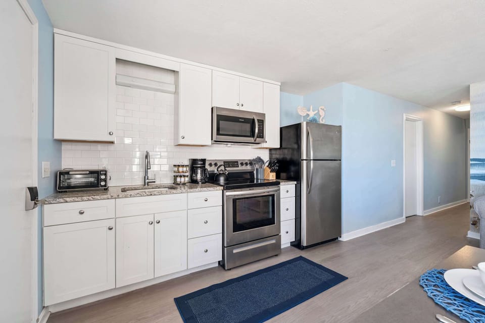 Fully equipped open kitchen, dining, and living room!