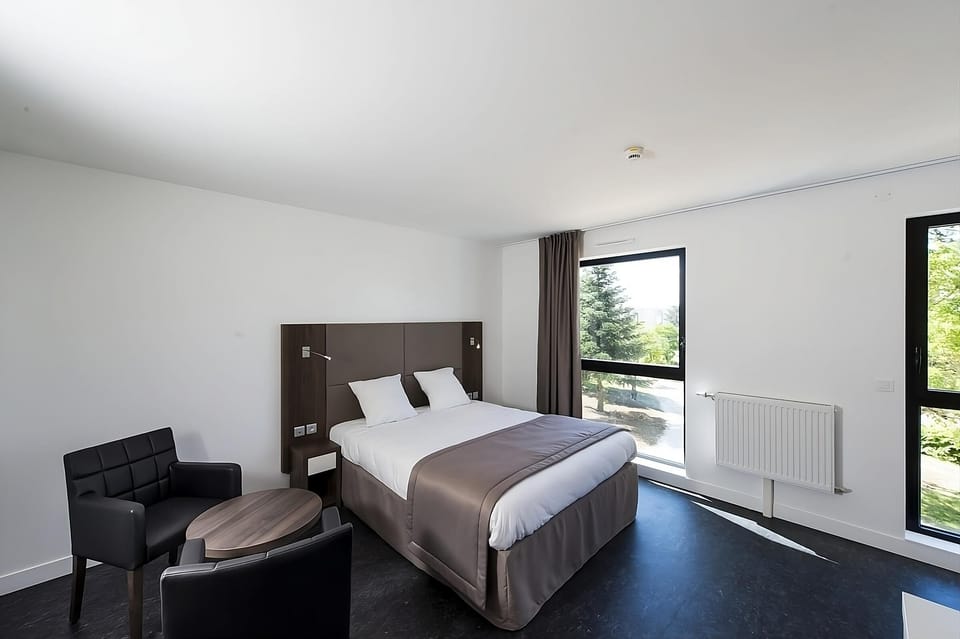 Unwind in a spacious double room with sunny garden views.