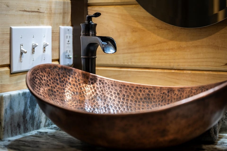 Unique finishes add a touch of rustic luxury to your stay.