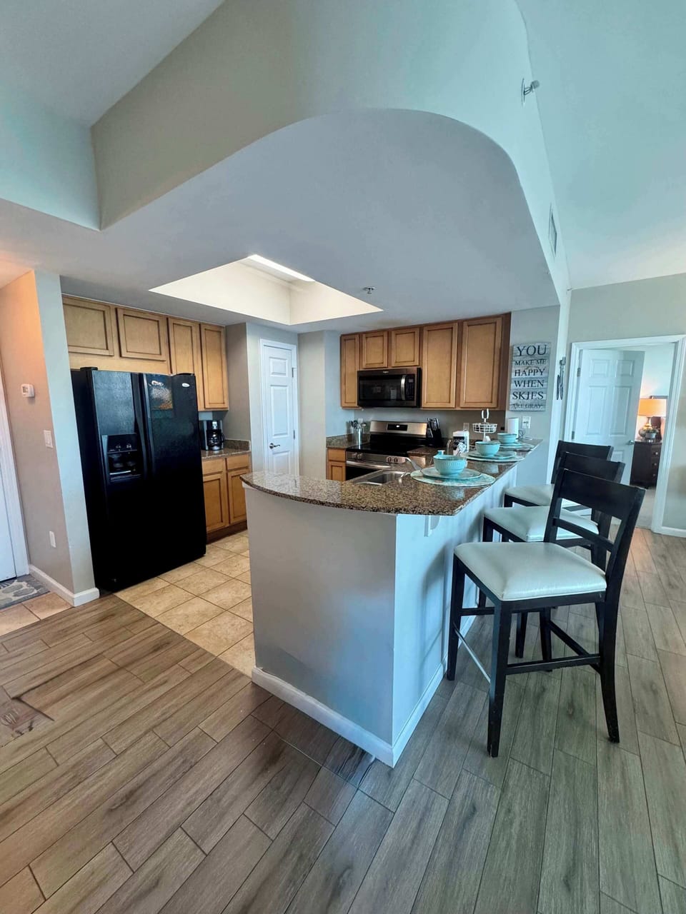 Fully stocked kitchen with snack bar seating