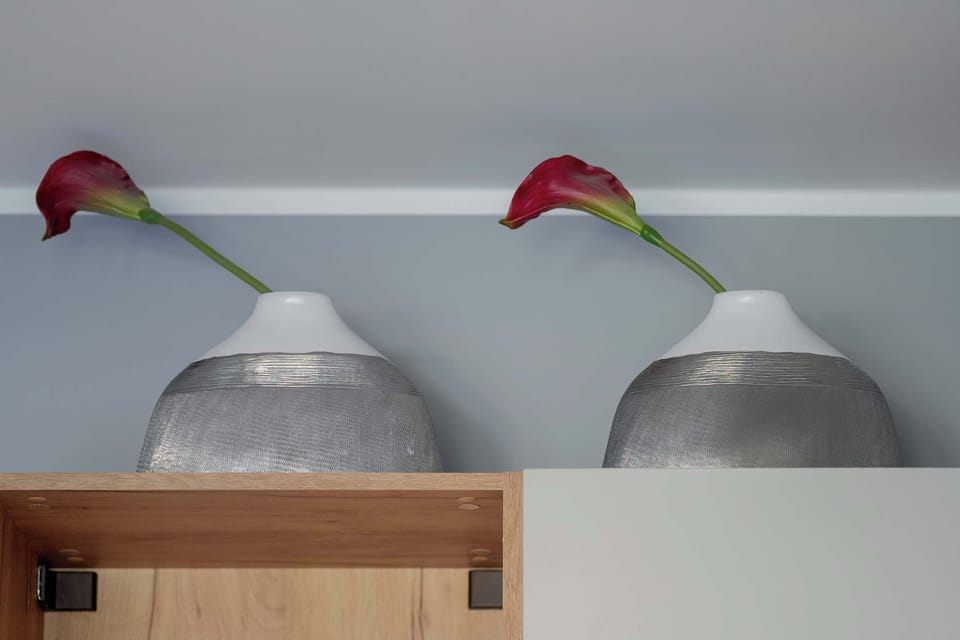 The bedroom's bright and functional space is ideal for unwinding.