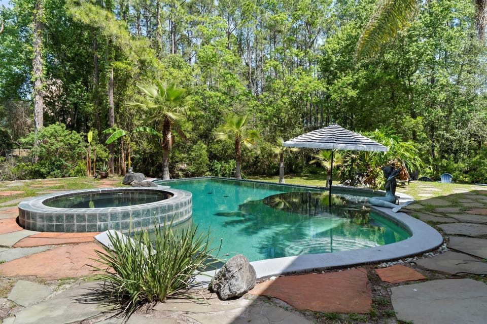 Relax and unwind in the pool or soak in the hot tub