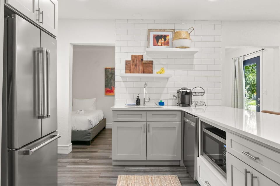 Entrance to the kitchen - full of stainless steel appliances