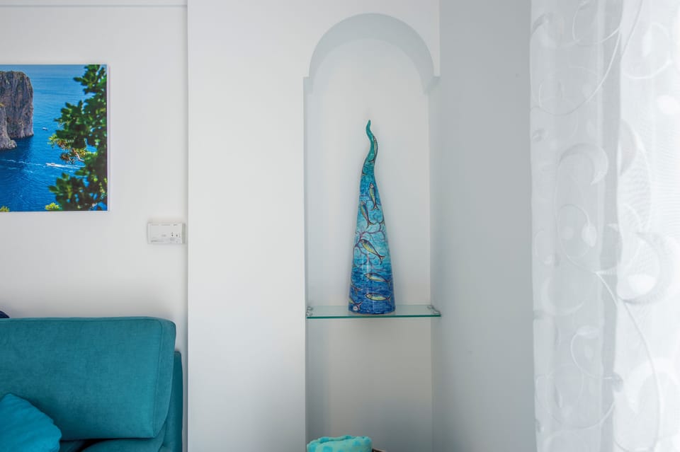 Handcrafted ceramic horn with marine-inspired motifs