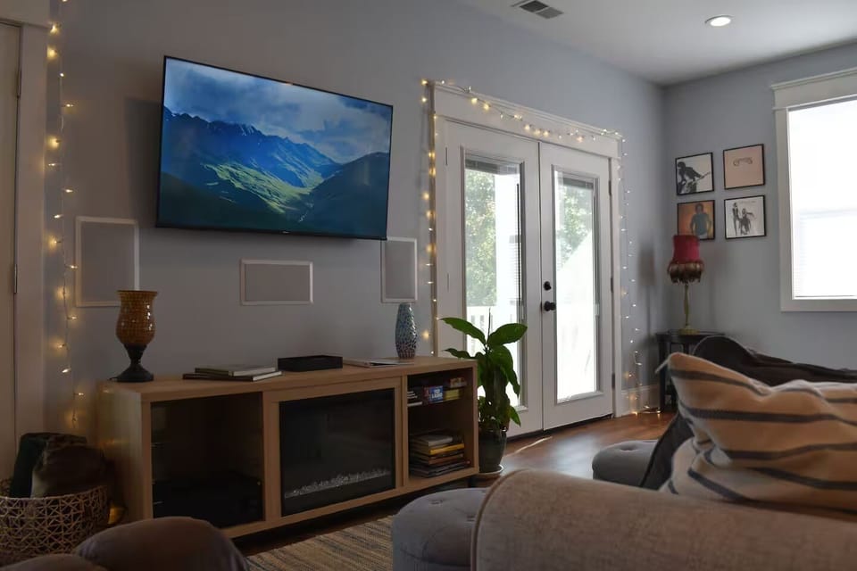 Sofa bed (queen), recliner, TV, electric fireplace and fairy lights! 