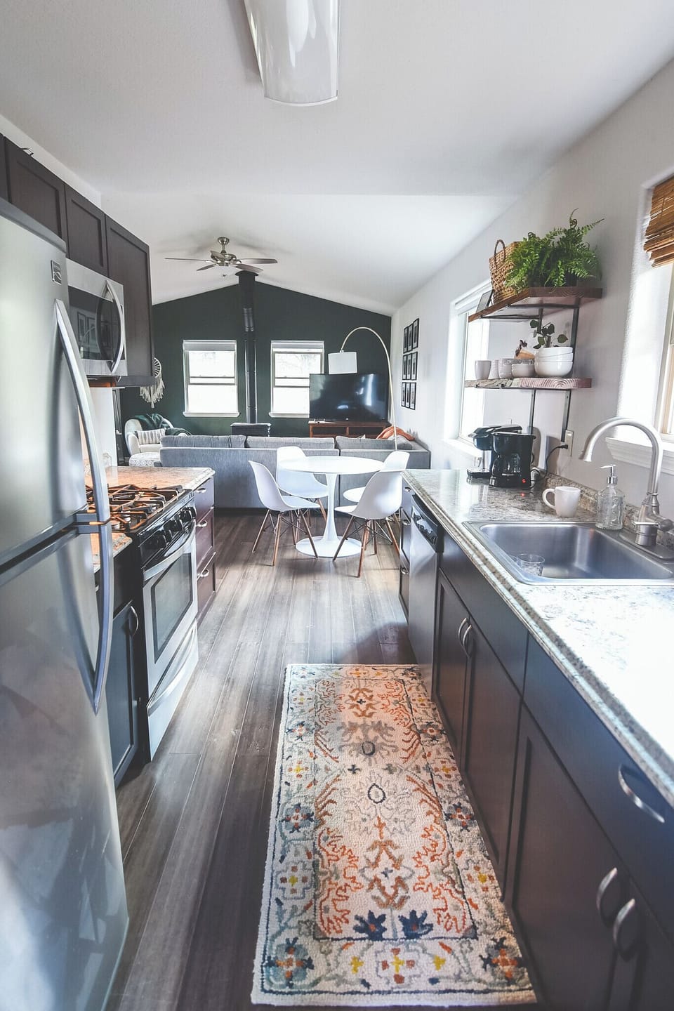 Galley kitchen, dining, and living room. Everything at your fingertips.