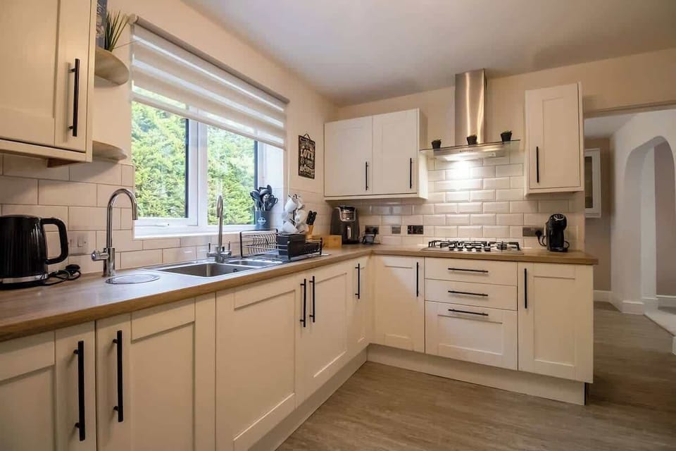 “Spacious kitchen with complete appliances — perfect for cooking, meal prep, or trying out new recipes.”
