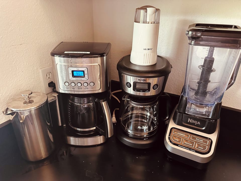 2 French Presses, 2 Coffee Makers, Ninja Blender for cocktails and smoothies.