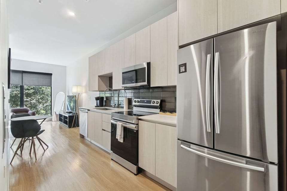 Cook effortlessly in the modern kitchen with stainless appliances.