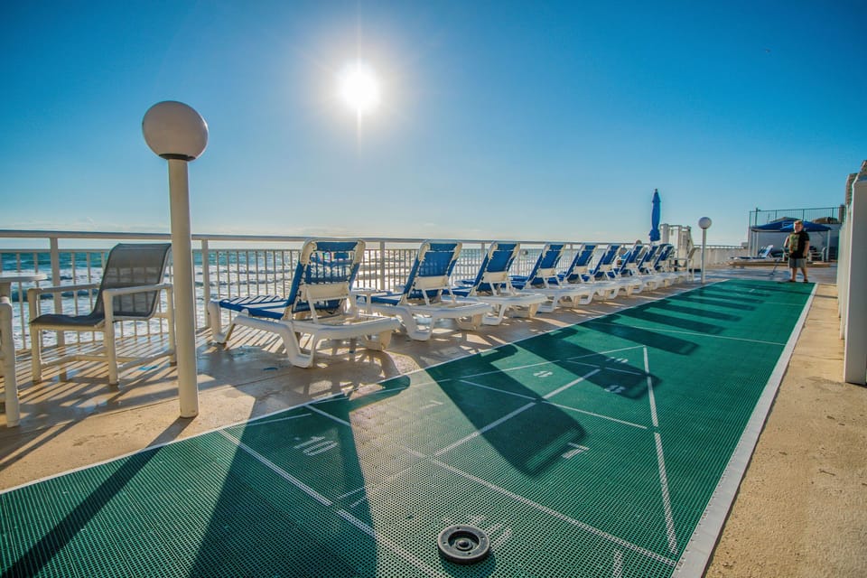 Sunshine fills the lounge area, where you can kick back on comfortable chairs and enjoy scenic views of the coastline.